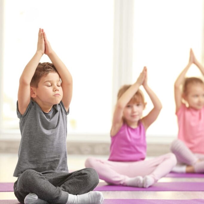 Group of children doing gymnastic exercises