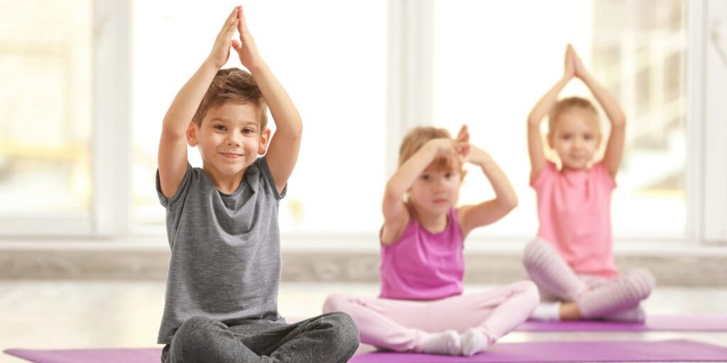 Group of children doing gymnastic exercises